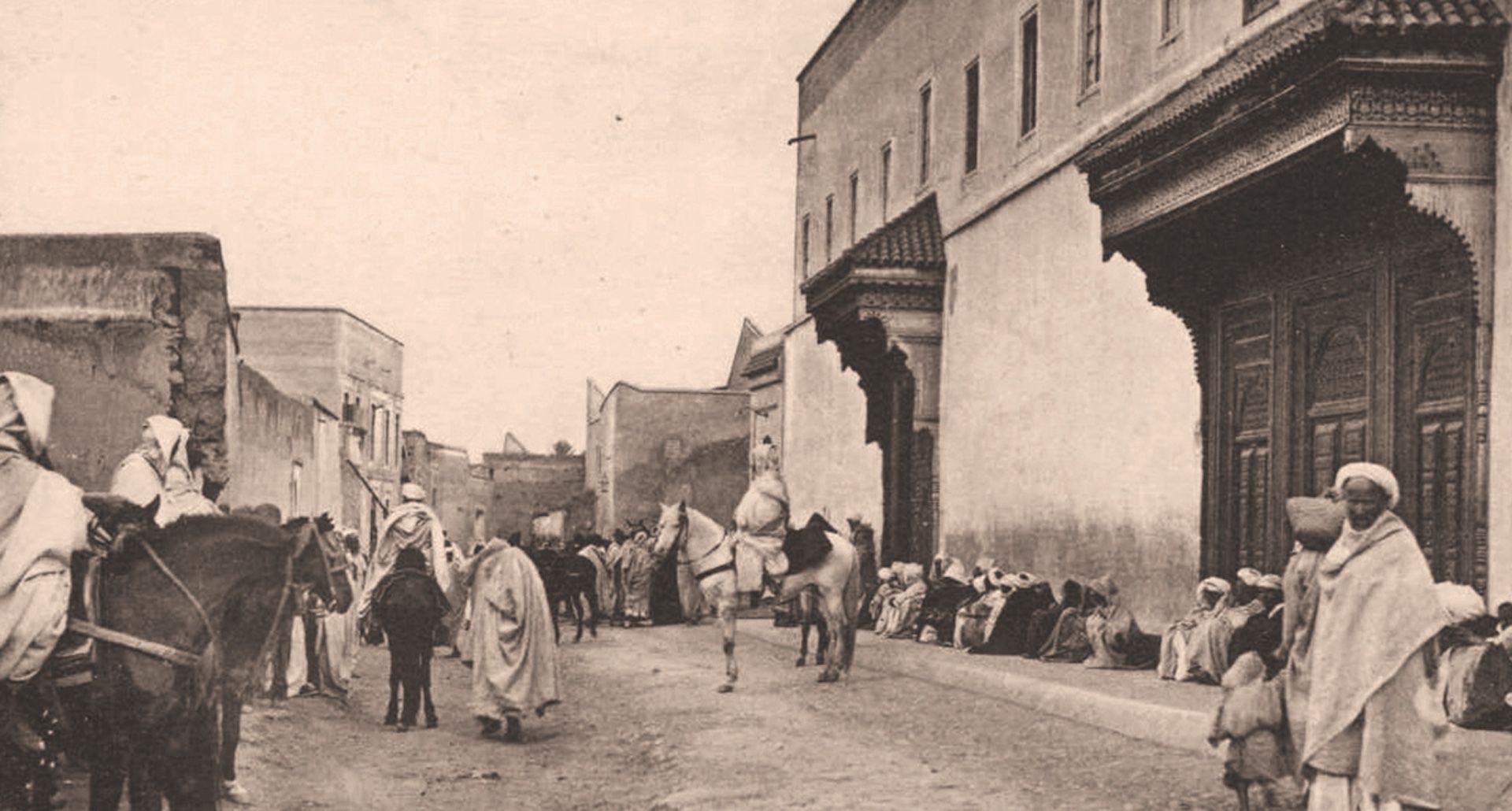 Bacha Coffee – Historic street view of the medina, Dar el Bacha, Marrakech, 1910